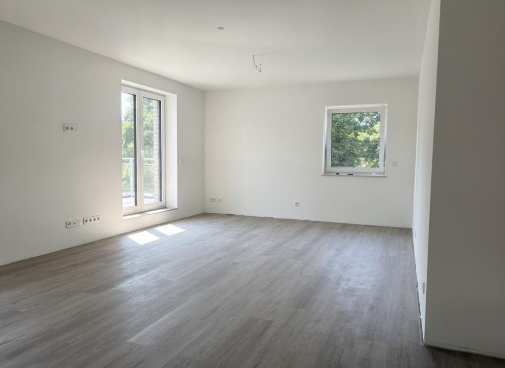 Erstbezug: Hochwertige Dachgeschosswohnung mit energieeffizienter Ausstattung - Foto 1