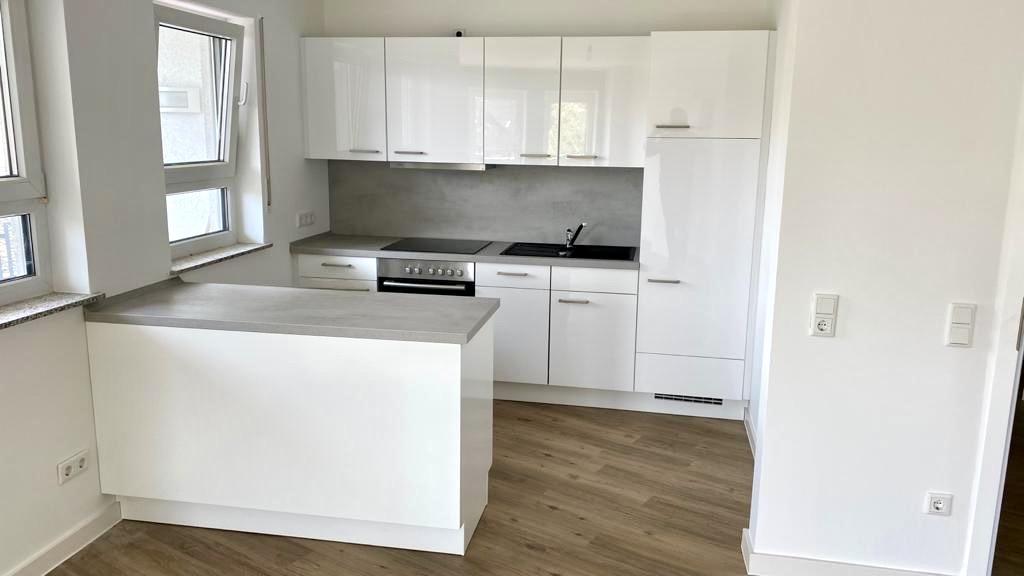 Gepflegte Wohnung mit Balkon und neuwertiger Einbauküche in WHU- Nähe - Photo 2