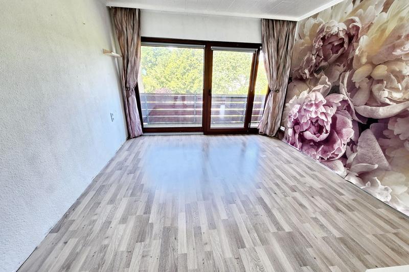 Schlafzimmer mit Balkon