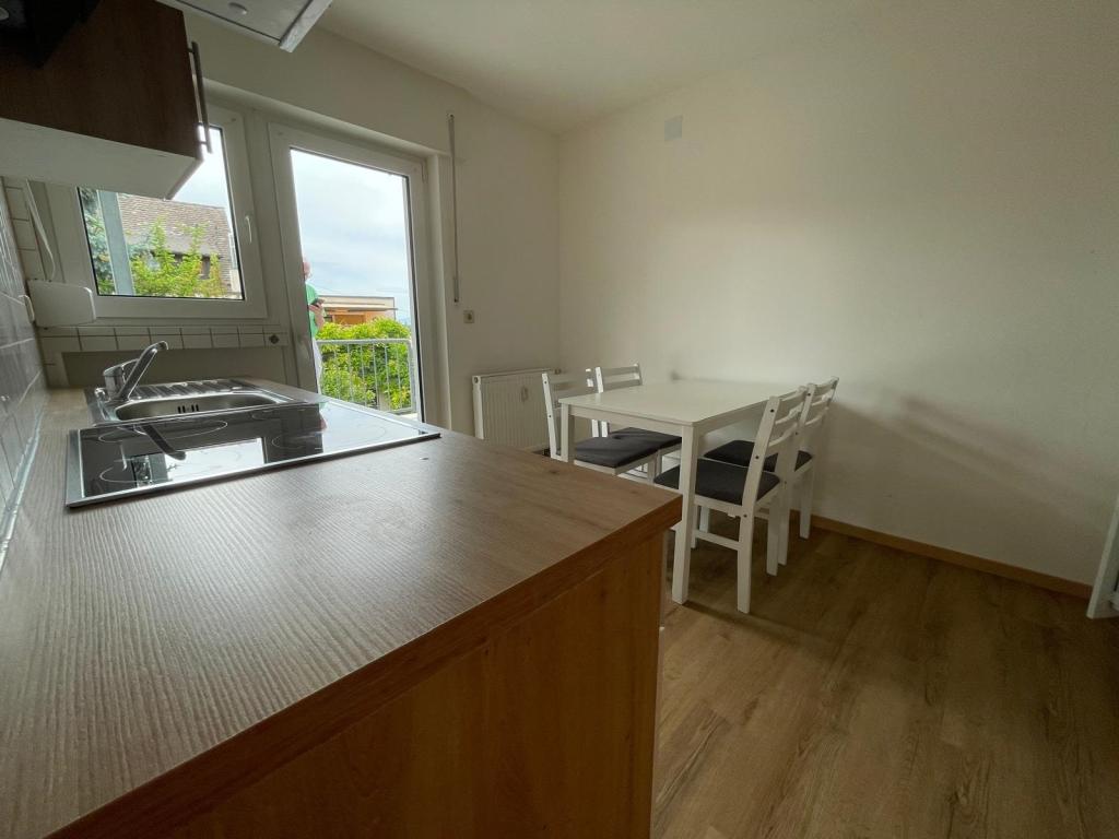 Gemütlich wohnen mit Balkon und Einbauküche - Foto 5