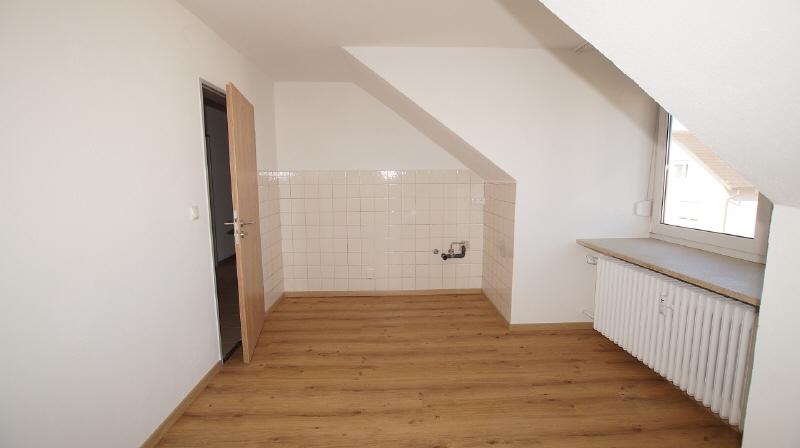Gepflegte 3-Zimmer-Dachgeschosswohnung - Foto 1
