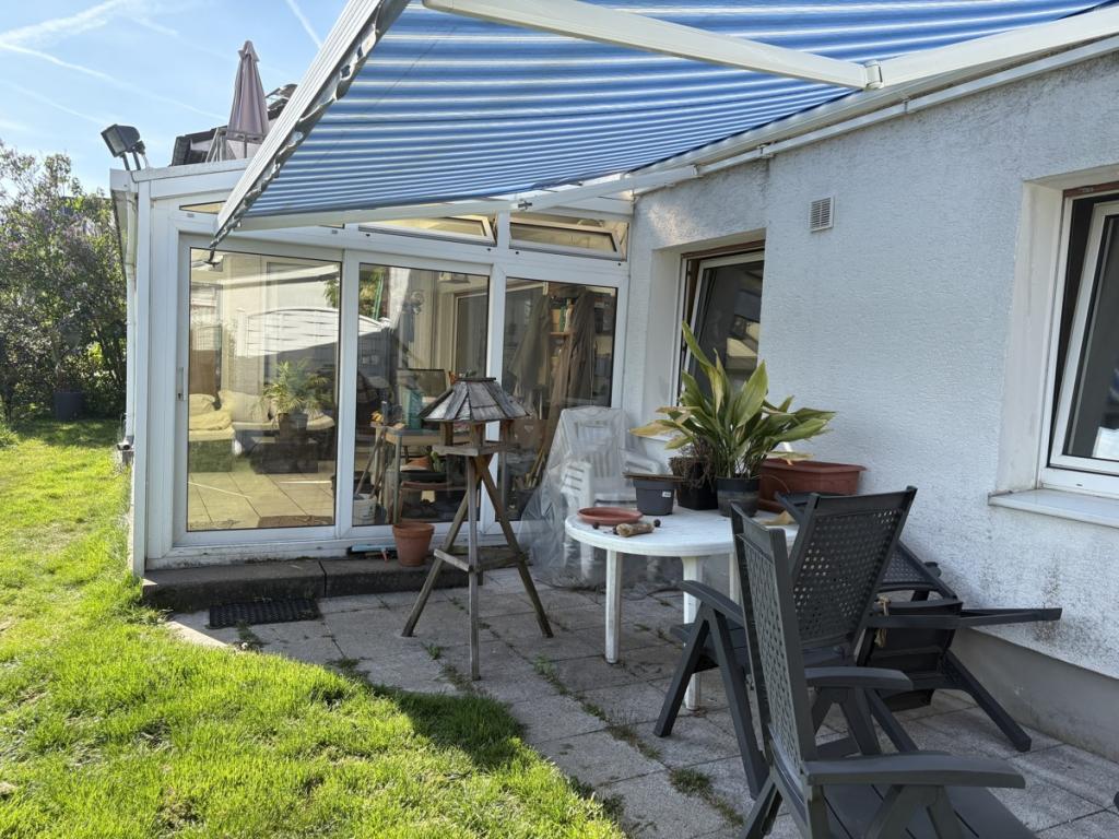 Terrasse mit Wintergarten