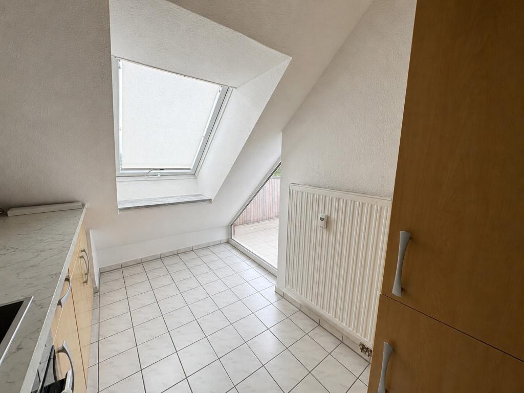 Helle Dachgeschosswohnung mit herrlichem Ausblick in bevorzugter Wohnlage - Foto 5