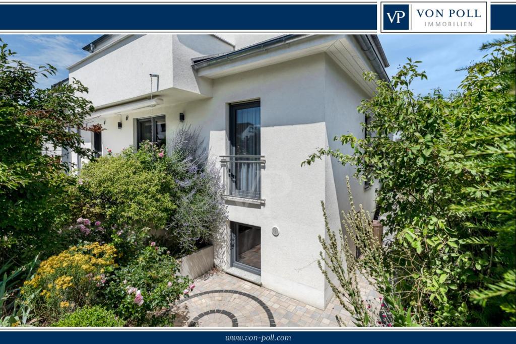 Stilvolles Effizienzhaus KfW55 mit Sauna, EBK, Garage und Gartenidylle in begehrter Lage