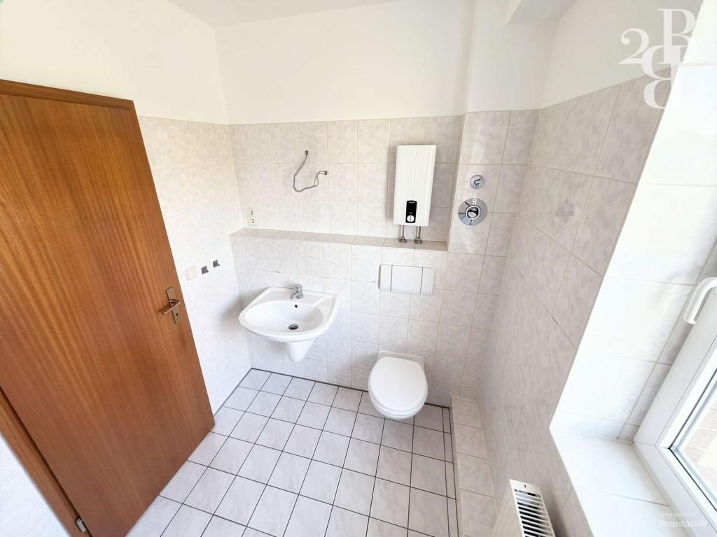 Gemütliche 2-Zimmer-Wohnung mit Tageslichtbad in der Hohen Börde - Foto 4