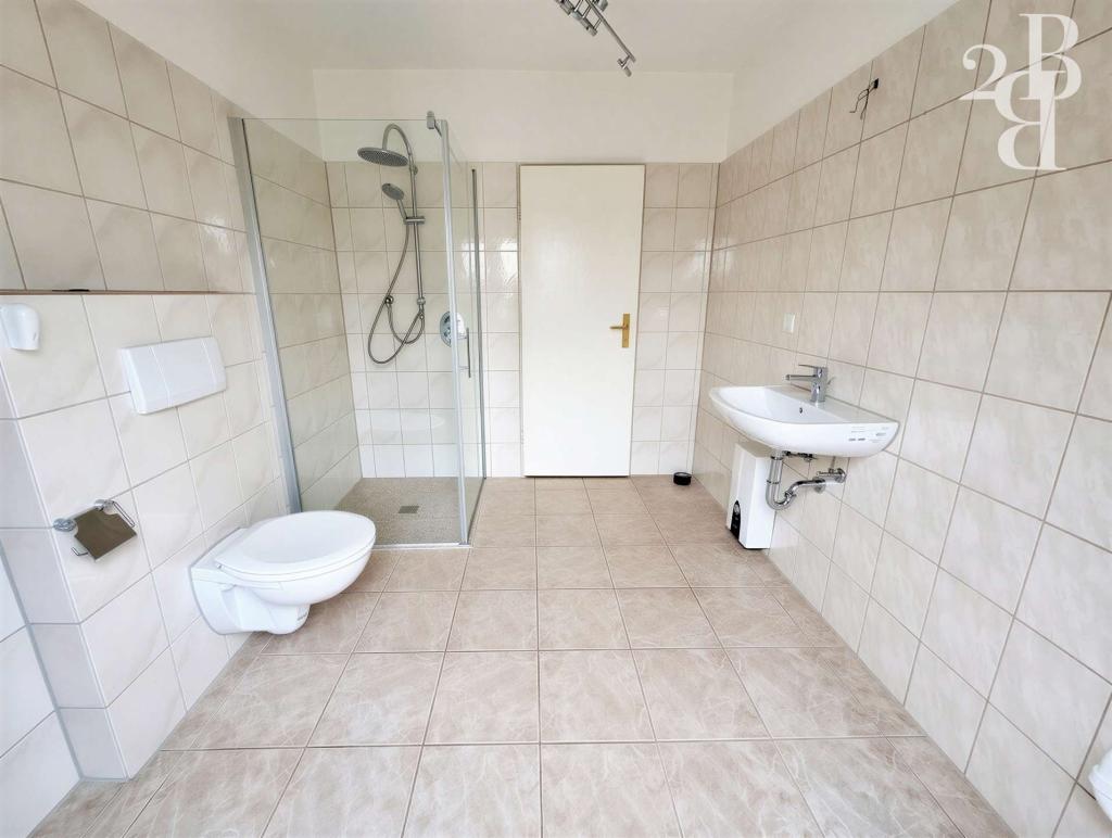 Lichtdurchflutete Dachgeschosswohnung in Eichenbarleben! - Photo 1