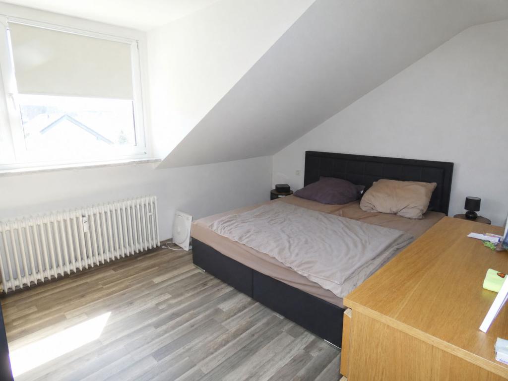 Gemütliche Dachgeschosswohnung mit Einbauküche - Foto 3