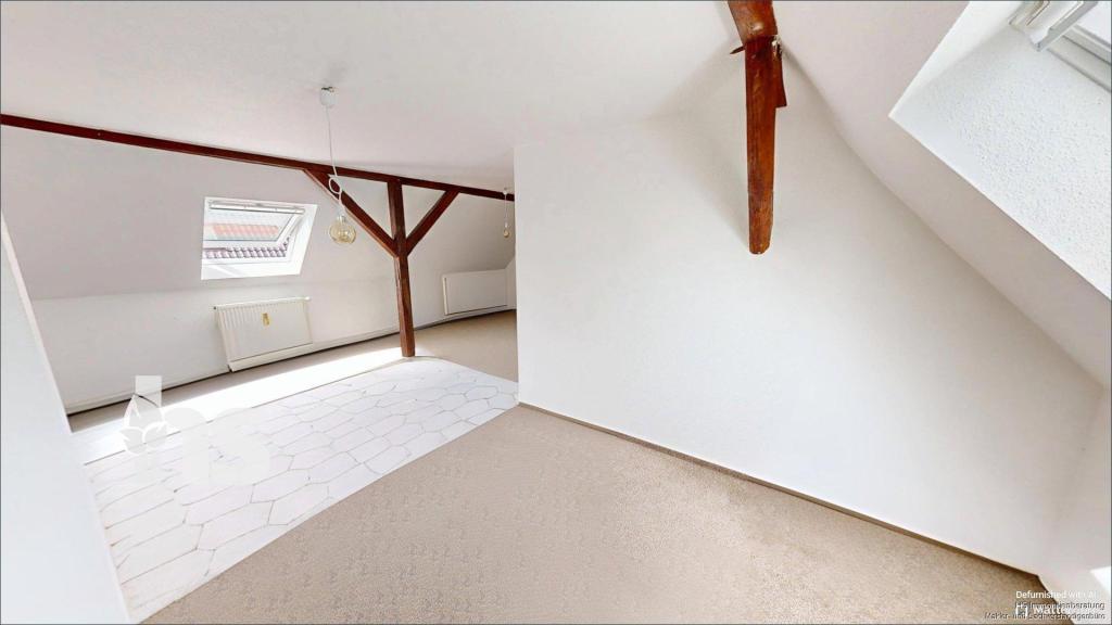 Wohn- und Esszimmer Wohnung DG