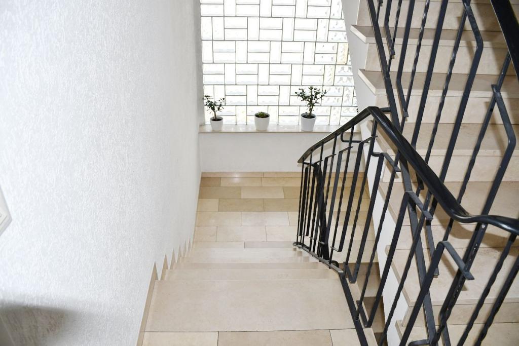 Treppe zum Ober- und Dachgeschoss