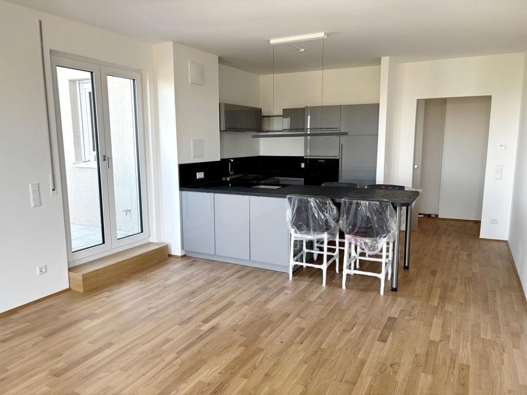 Helligkeit & Eichenholz: Barrierefreie 3-Zimmer-Wohnung mit West-Dachterrasse & Fernblick. - Photo 4