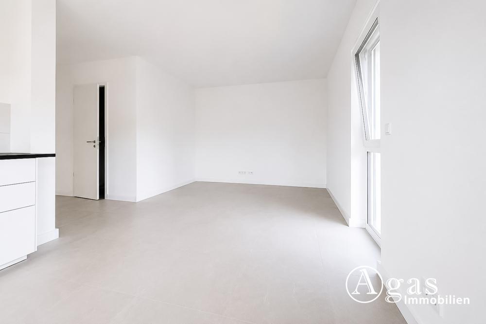 Erstbezug! Helle 3-Zimmer-Wohnung mit Südbalkon, EBK, Aufzug und PKW-Stellplatz - Foto 1