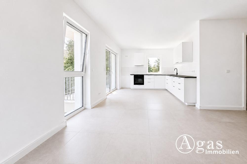 Erstbezug! Helle 3-Zimmer-Wohnung mit Südbalkon, EBK, Aufzug und PKW-Stellplatz - Foto 2