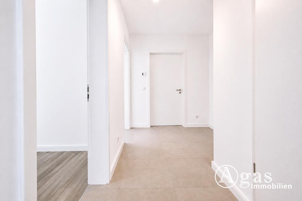 Erstbezug! Helle 3-Zimmer-Wohnung mit Südbalkon, EBK, Aufzug und PKW-Stellplatz - Foto 5