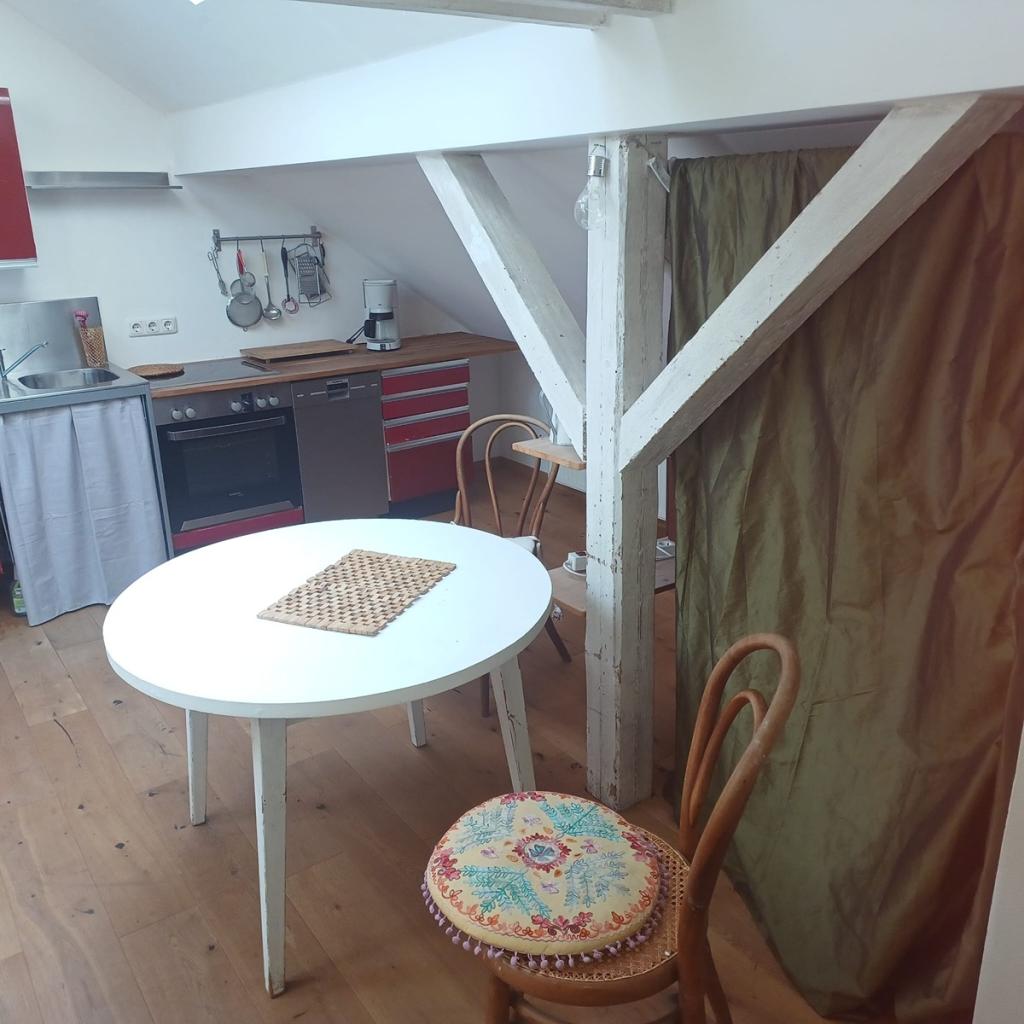 Idyllisch gelegene DG-Wohnung (2.OG) mit Gartenbenutzung - Foto 5