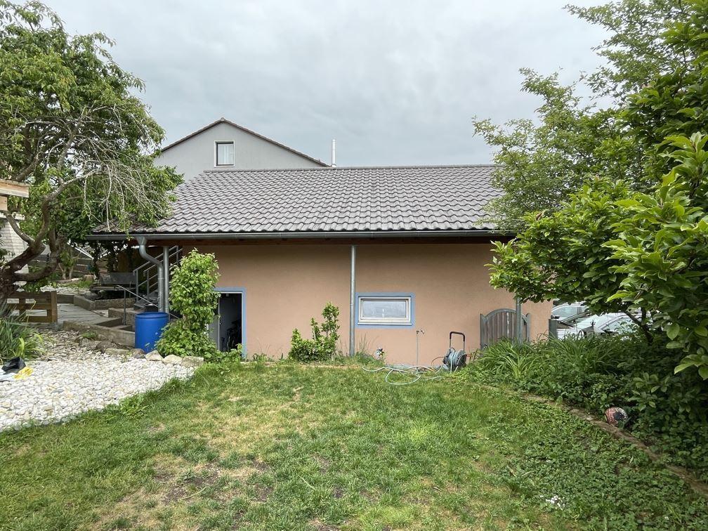 Garage Ansicht von Westen und Garten