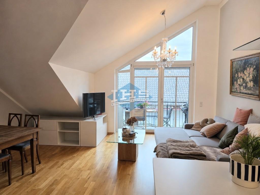 Großzügige und sonnige 3-Zimmer-Dachwohnung mit 2 Balkonen in Heimstetten - Foto 2