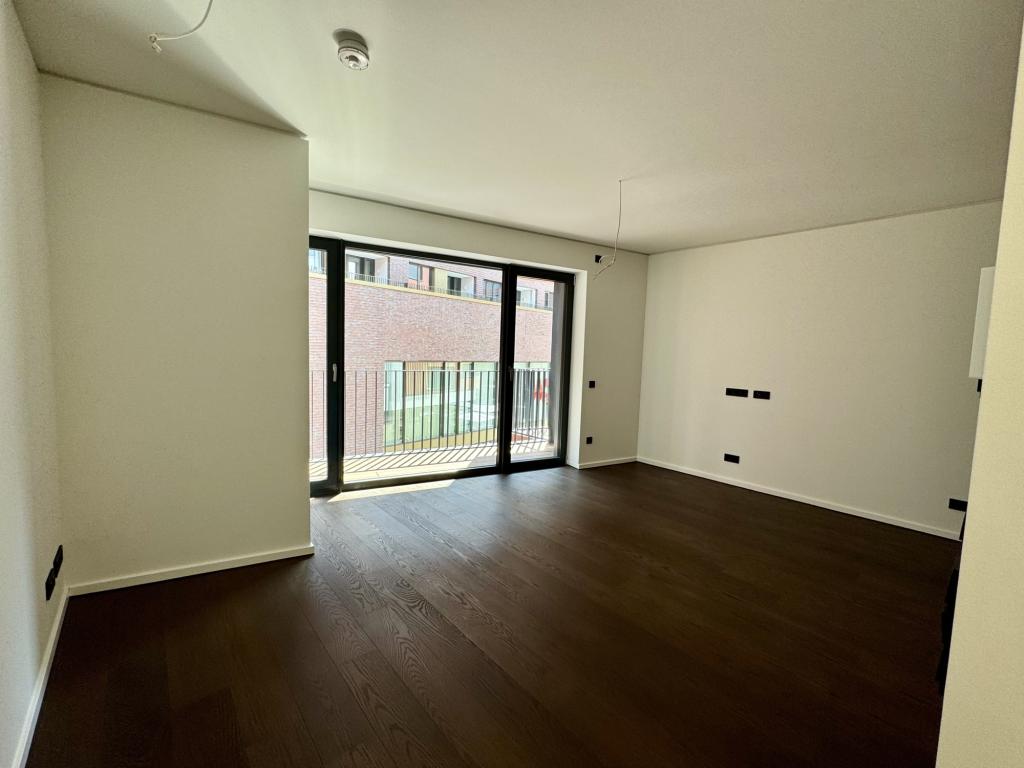 Wohnbereich mit Zugang zur Loggia