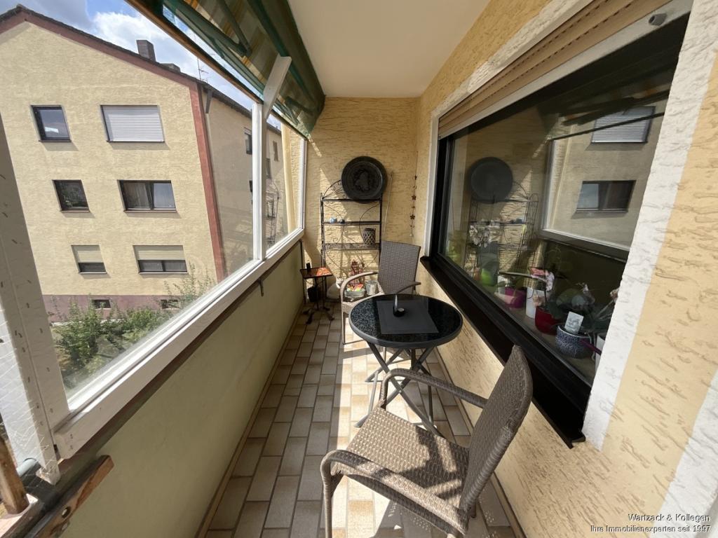 Balkon mit Wetterschutz