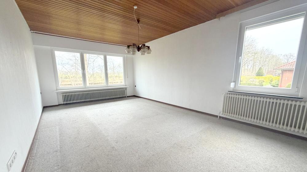 Freistehendes Einfamilienhaus mit großem Gartengrundstück in Wardenburg/Harbern I - Foto 1