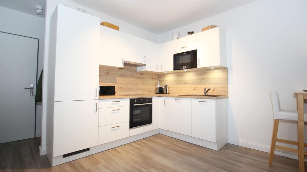 Exklusives Wohnen in einer 2-Zimmer-Penthouse-Wohnung mit Dachterrasse und Stellplatz inkl. EBK - Photo 3