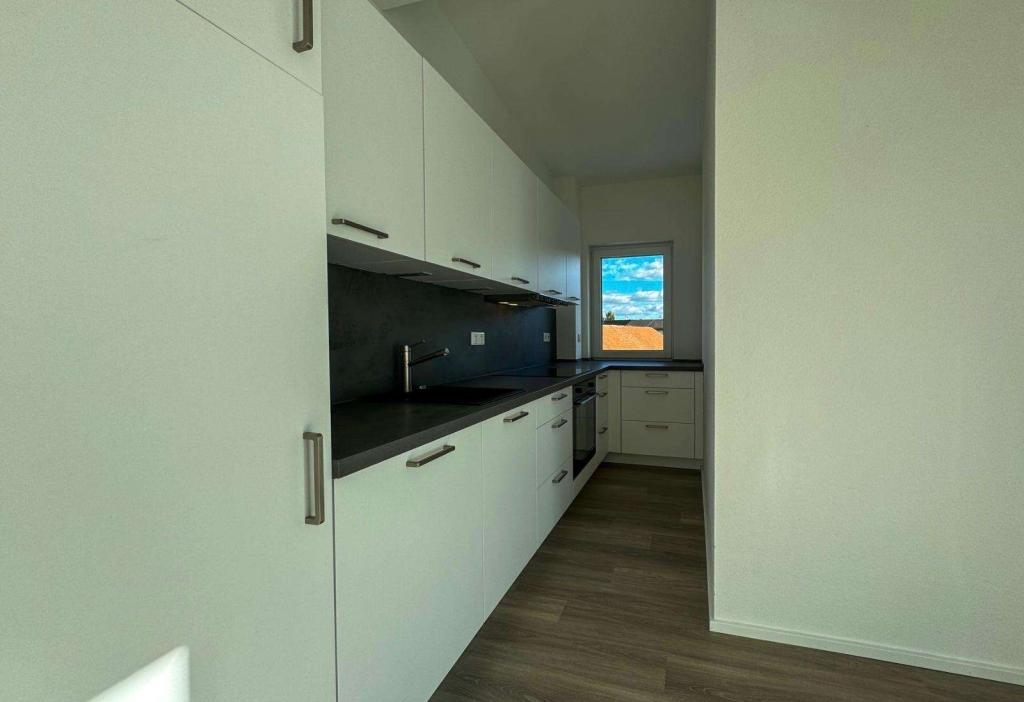 Geräumige Dachgeschosswohnung mit Balkon - Photo 1