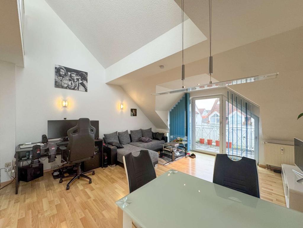 Gemütliche Dachgeschoss-Maisonettewohnung in Ober-Mörlen - Photo 1