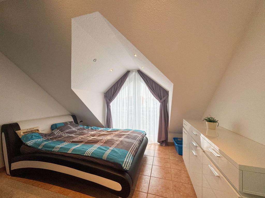 Gemütliche Dachgeschoss-Maisonettewohnung in Ober-Mörlen - Photo 3