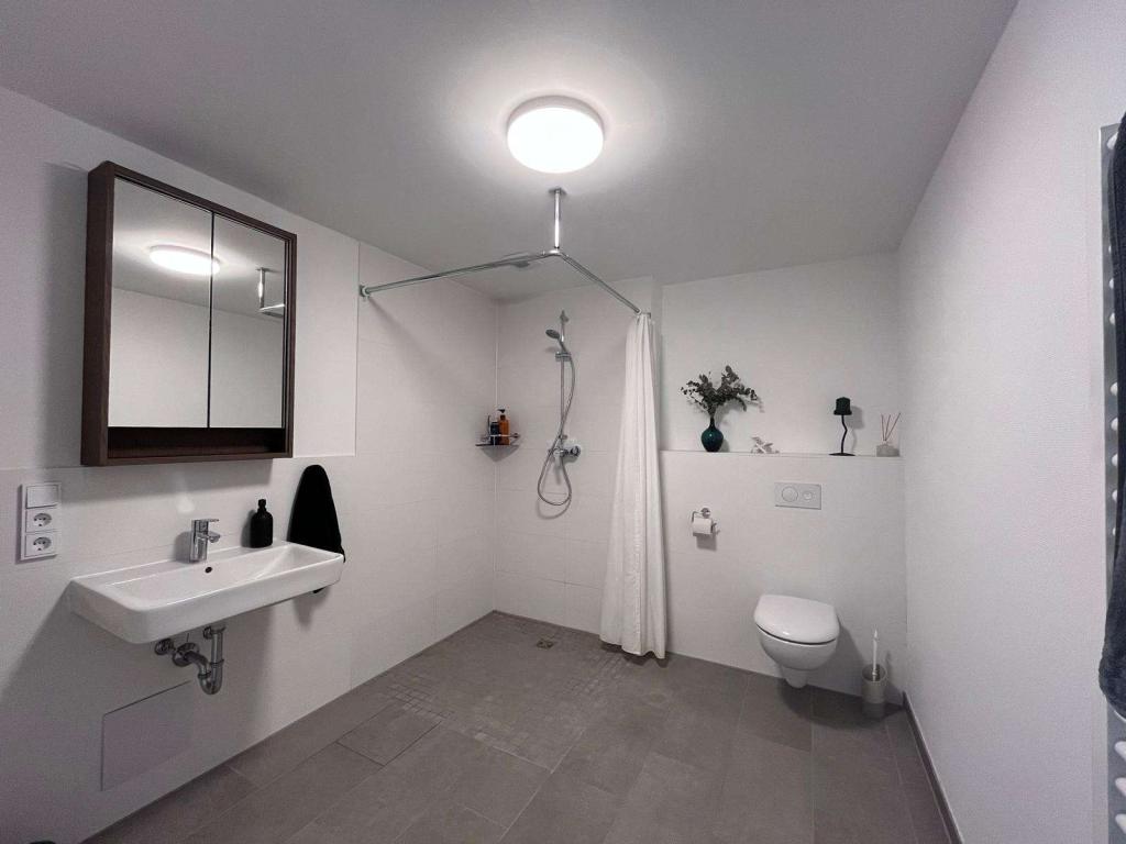 Modern wohnen in Nieder-Weisel – 3 Zimmer mit Balkon und zwei Stellplätzen - Photo 4