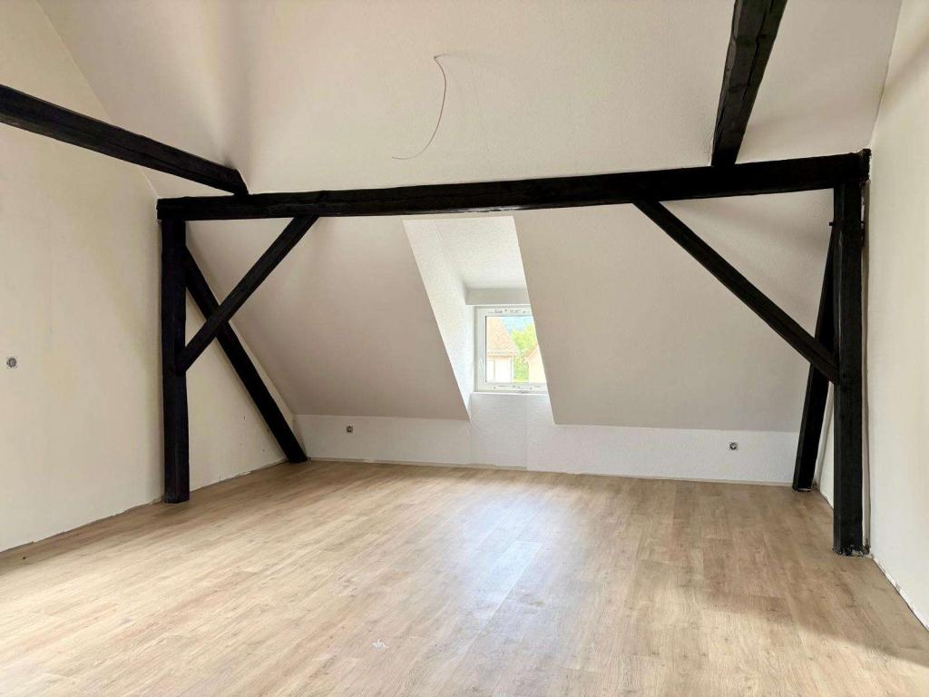 Stilvolle Dachgeschosswohnung mit besonderem Charme - Foto 5