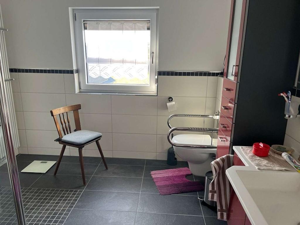 1486149-E6hhNRKLM2uoWdJCBezaFKSF-40376-lang7_IMAXX_Main-Kinzig-Budingen_8 Badezimmer Whg 1.jpg