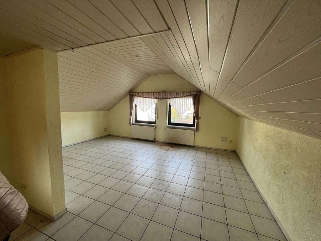 1486149-ugjj9mBZ8mGdPMzQ7jC4UWfA-40376-lang12_IMAXX_Main-Kinzig-Budingen_13 Wohnzimmer Wohnung 2.jpg