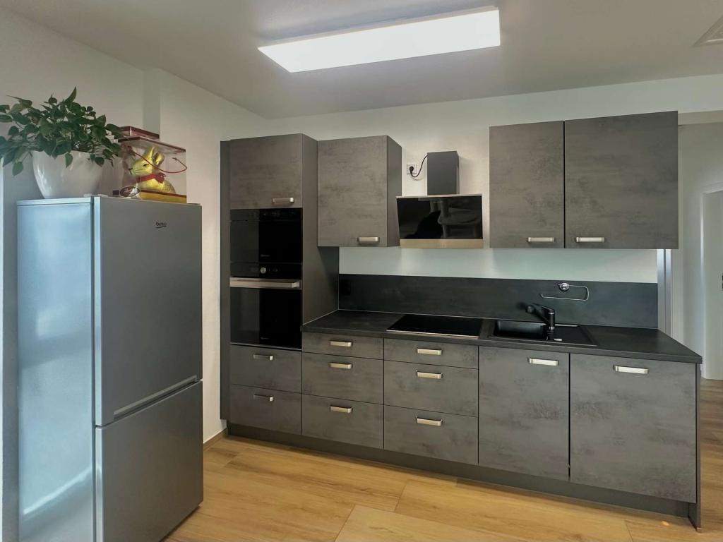 Moderne 3-Zimmer-Dachgeschosswohnung in Gießen-Lützellinden - Foto 3