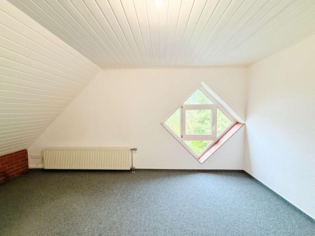 Gemütliche 3-Zimmer-Dachgeschosswohnung mit Blick ins Grüne in Homberg (Ohm) – Erbenhausen - Foto 4