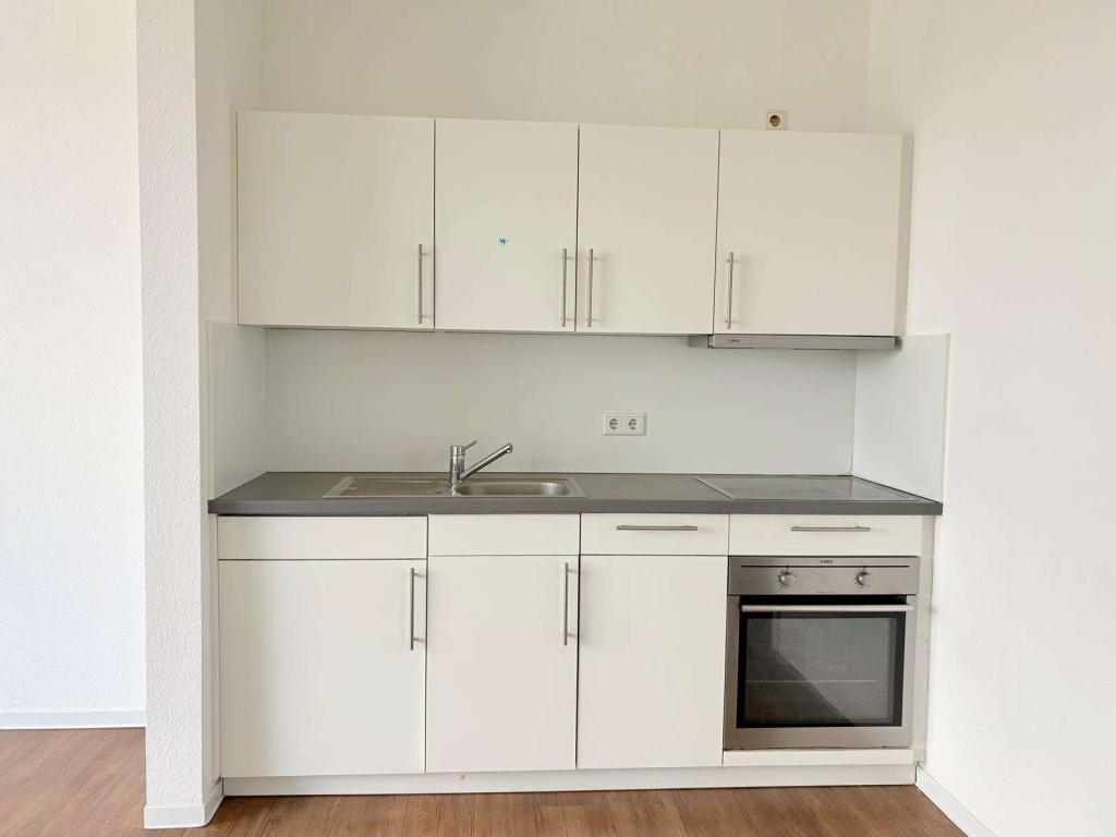 Schickes 1 Zimmer Penthouse-Apartment an den Lahnwiesen - Foto 4