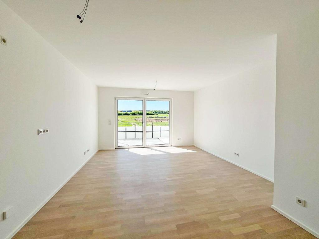 Modernes 1-Zimmer-Apartment mit Balkon und PKW-Stellplatz in Ober-Mörlen - Photo 1