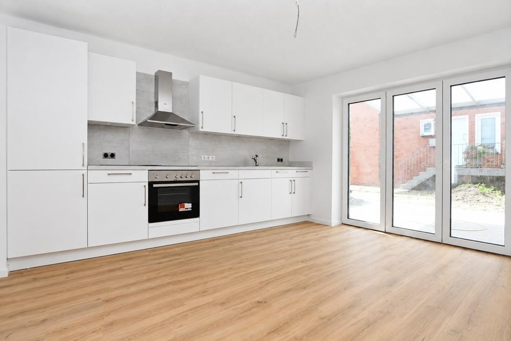 Erstbezug - Barrierefreie Neubauwohnung mit Einbauküche, überdachter Terrasse und PKW-Stellplatz in Altenoythe - Photo 1