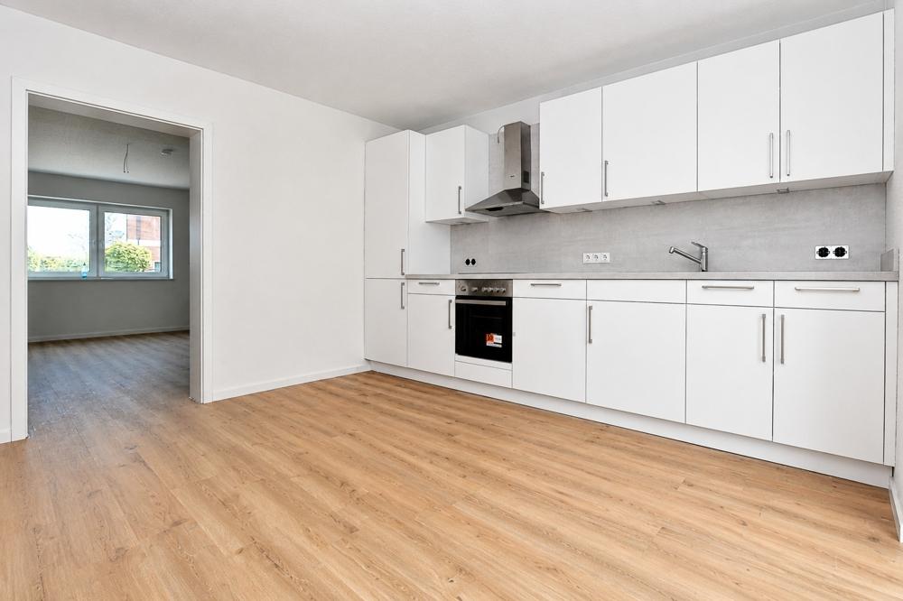 Erstbezug - Barrierefreie Neubauwohnung mit Einbauküche, überdachter Terrasse und PKW-Stellplatz in Altenoythe - Photo 2
