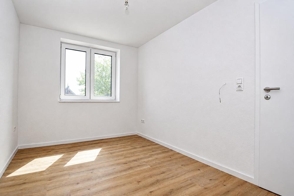 Erstbezug - Neubauwohnung mit Einbauküche, Dachterrasse mit Markise und PKW-Stellplatz in Altenoythe - Foto 5