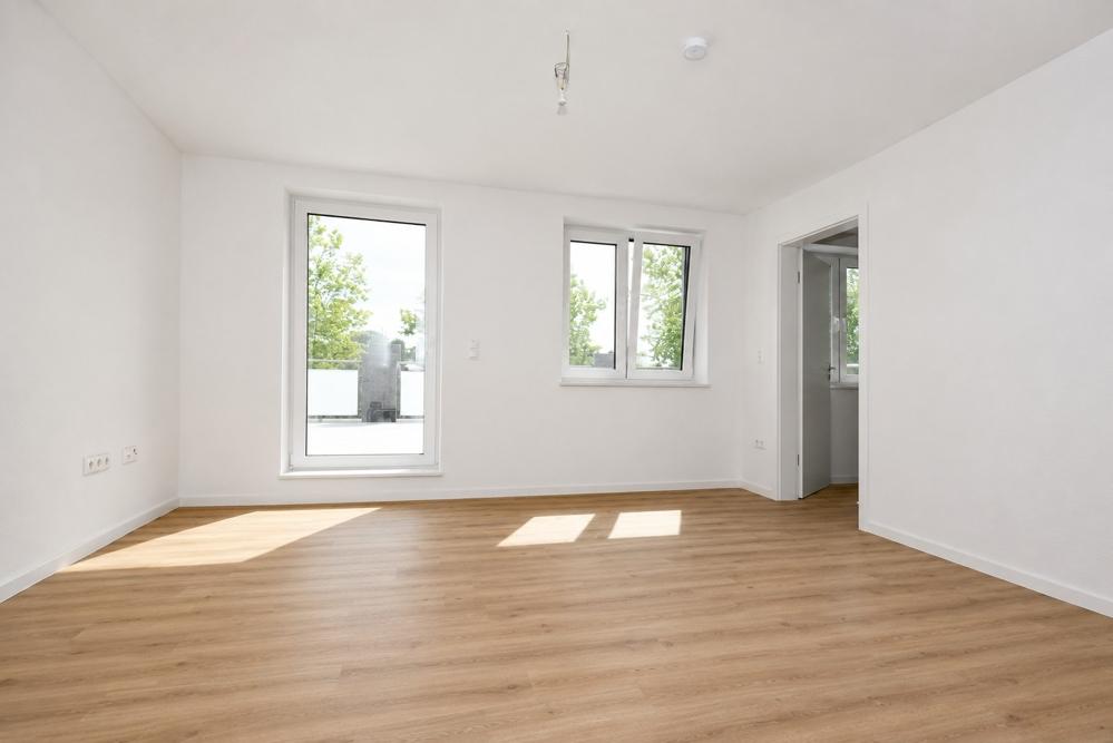 Erstbezug - Neubauwohnung mit Einbauküche, Dachterrasse mit Markise und PKW-Stellplatz in Altenoythe - Foto 1