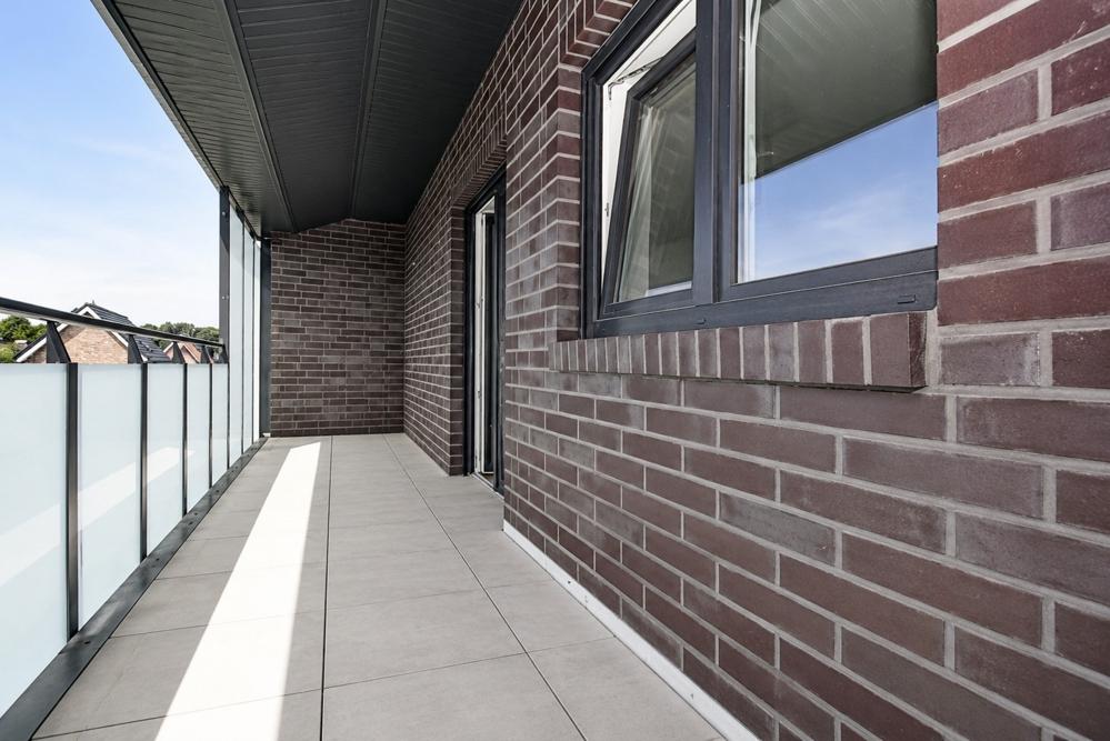 Erstbezug - Neubauwohnung mit Einbauküche, Balkon und PKW-Stellplatz in Altenoythe - Photo 5
