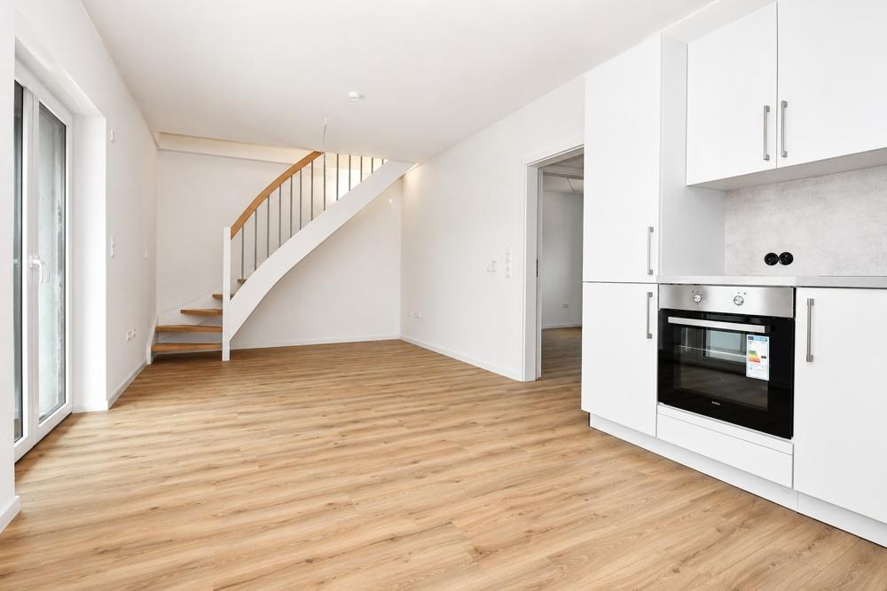 Erstbezug - Neubauwohnung mit Einbauküche, Balkon und PKW-Stellplatz in Altenoythe - Photo 2