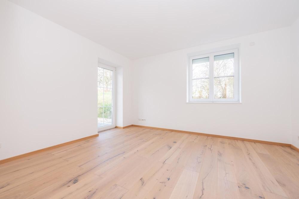 Schlafzimmer mit Zugang zur Terrasse