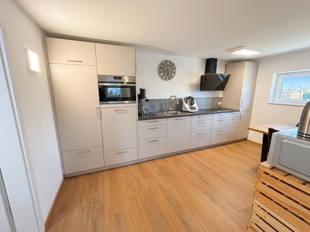 Traumhafte, neuwertige 2-Zimmer Souterrain-Wohnung mit eigener Süd-Terrasse in ruhiger Dorfrandlage - Photo 4