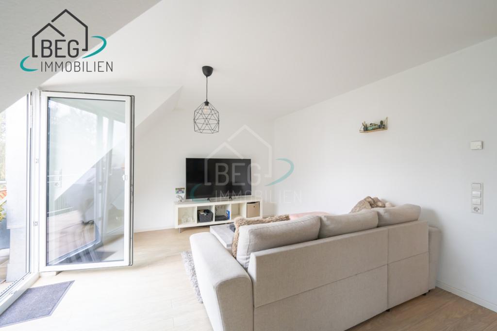 Hochwertige 3,5-Zimmer-Dachgeschosswohnung mit Südwestbalkon und Blick ins Grüne - Foto 1