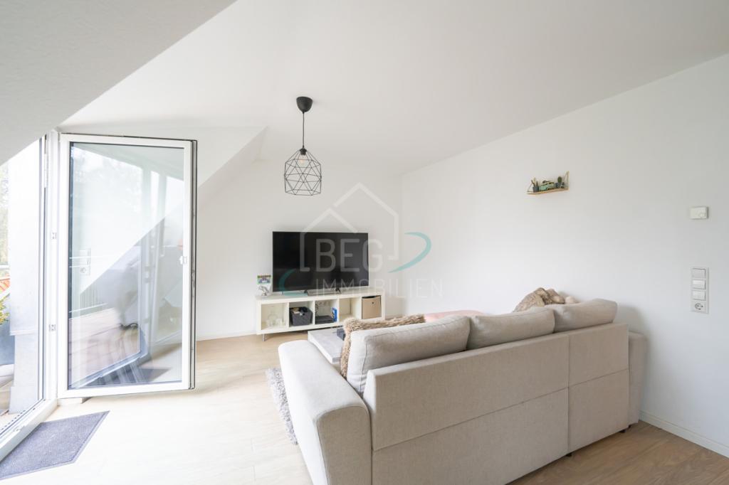 Hochwertige 3,5-Zimmer-Dachgeschosswohnung mit Südwestbalkon und Blick ins Grüne - Foto 2