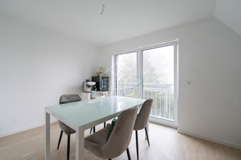 Hochwertige 3,5-Zimmer-Dachgeschosswohnung mit Südwestbalkon und Blick ins Grüne - Foto 3