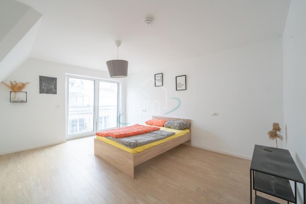 Hochwertige 3,5-Zimmer-Dachgeschosswohnung mit Südwestbalkon und Blick ins Grüne - Foto 4
