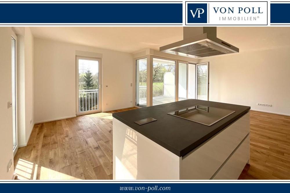 Moderne Erdgeschosswohnung mit Einbauküche, Balkon und Blick ins Grüne - Photo 5
