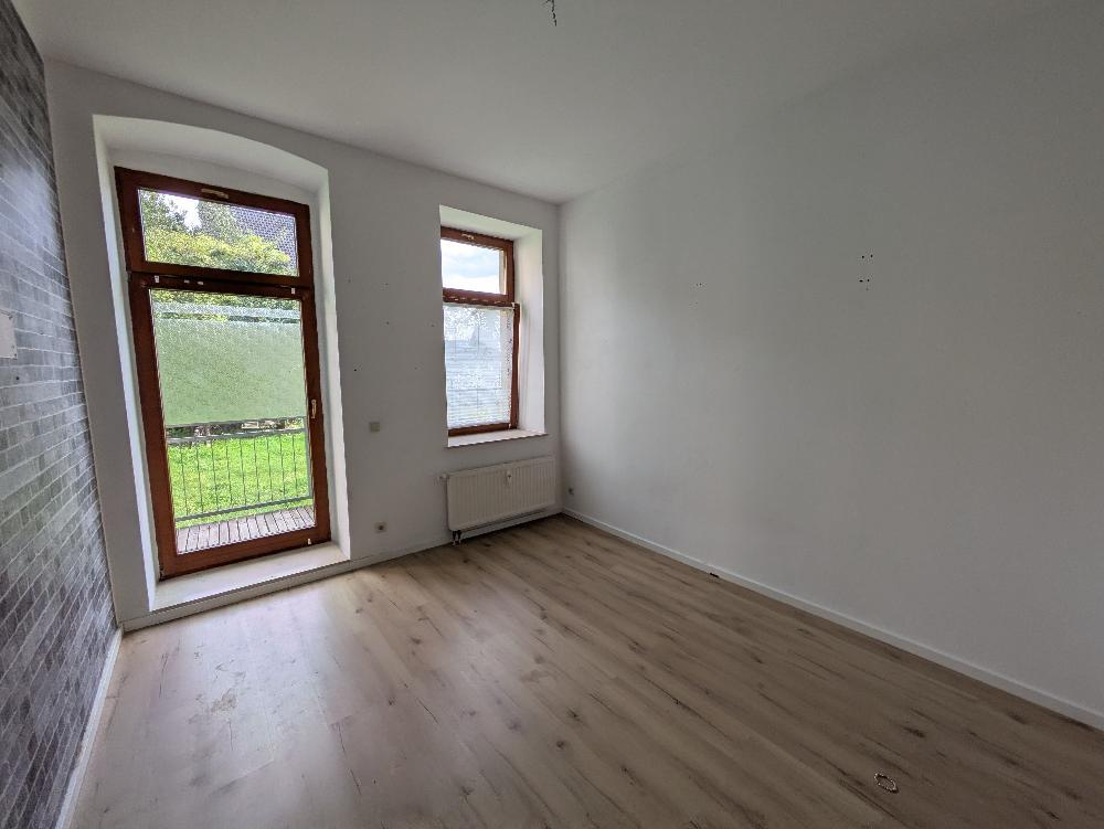3-Zimmer-Wohnung im EG mit Balkon & eigenem Eingang – Denkmalobjekt, idealer Preis - Photo 1