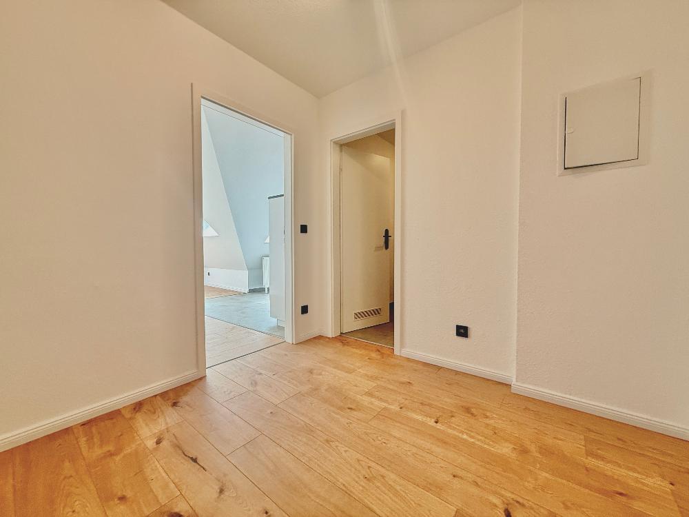 Modernisierte 1-Raum-Dachgeschosswohnung mit Einbauküche in ruhiger Lage von Leipzig-Liebertwolkwitz - Foto 4